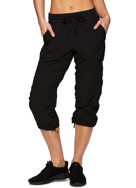 Breathable, lightweight woven fabric keeps you cool and dries quickly. . Rbx capris